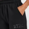 Pantalon de jogging oversize à jambes droites avec logo « Varsity » appliqué