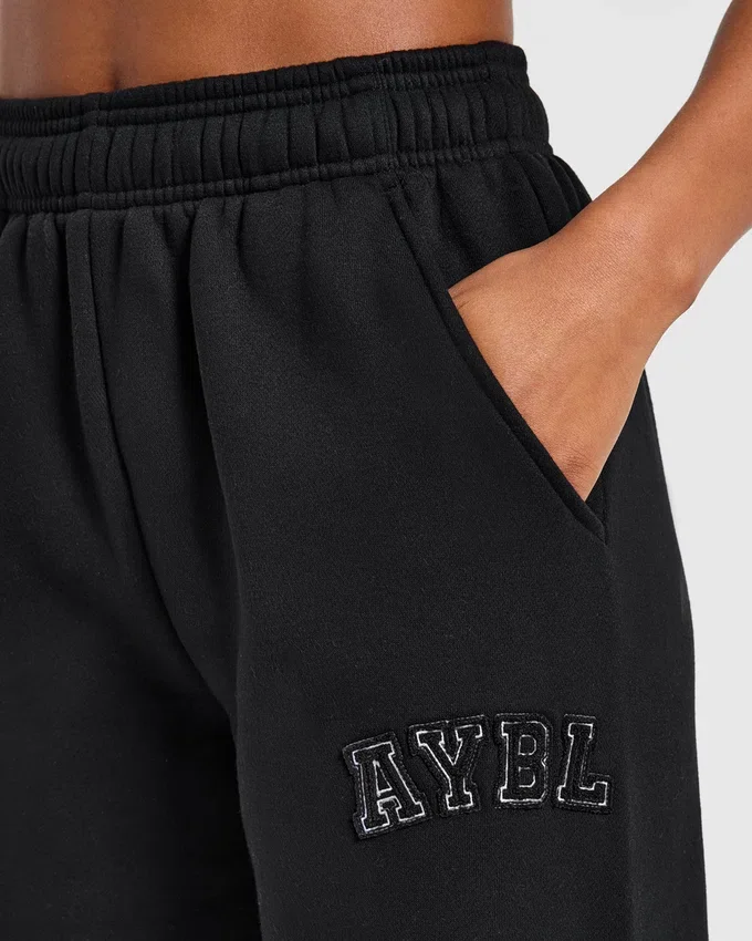 Pantalon de jogging oversize à jambes droites avec logo « Varsity » appliqué