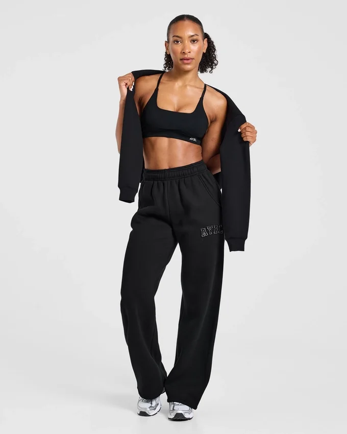 Pantalon de jogging oversize à jambes droites avec logo « Varsity » appliqué