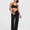 Pantalon de jogging oversize à jambes droites avec logo « Varsity » appliqué