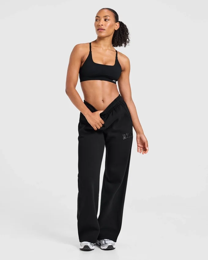 Pantalon de jogging oversize à jambes droites avec logo « Varsity » appliqué