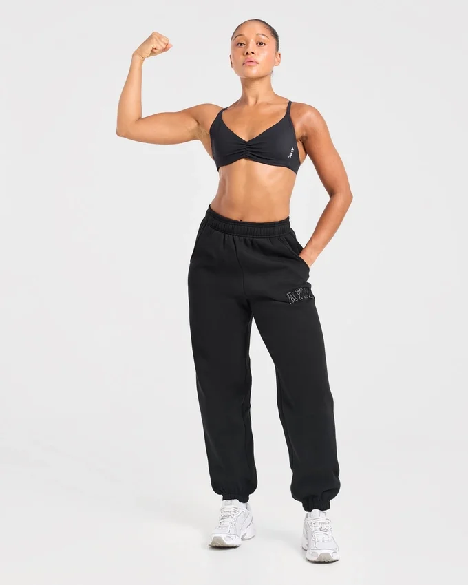Pantalon de jogging oversize « Varsity » avec logo appliqué