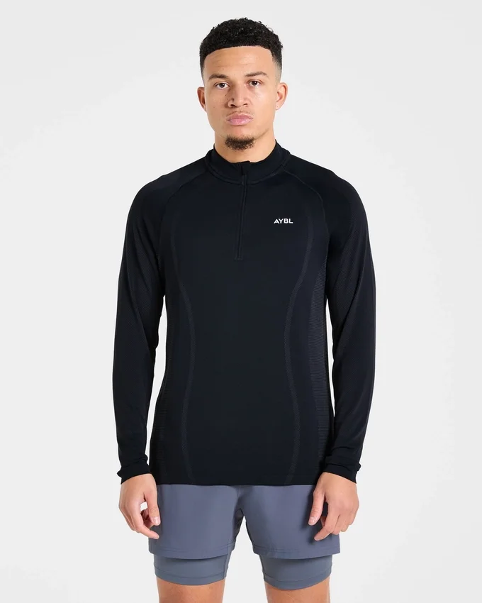 Pull Attain sans coutures à demi-zip