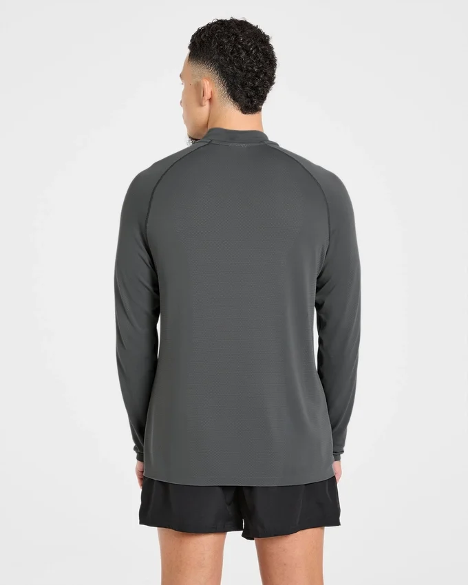 Pull Attain sans coutures à demi-zip