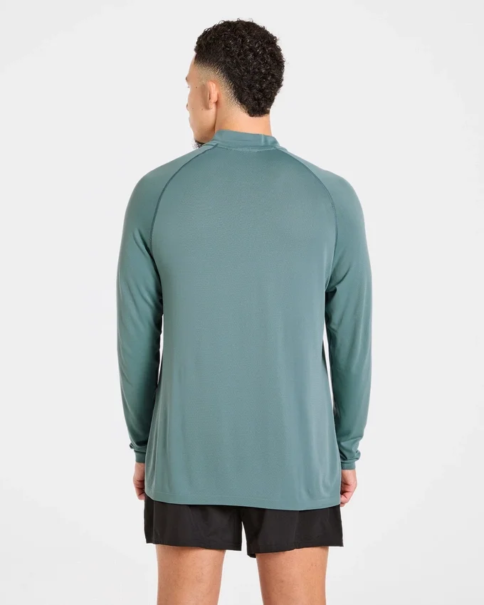 Pull Attain sans coutures à demi-zip