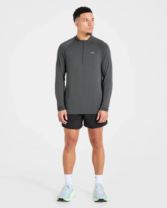 Pull Attain sans coutures à demi-zip