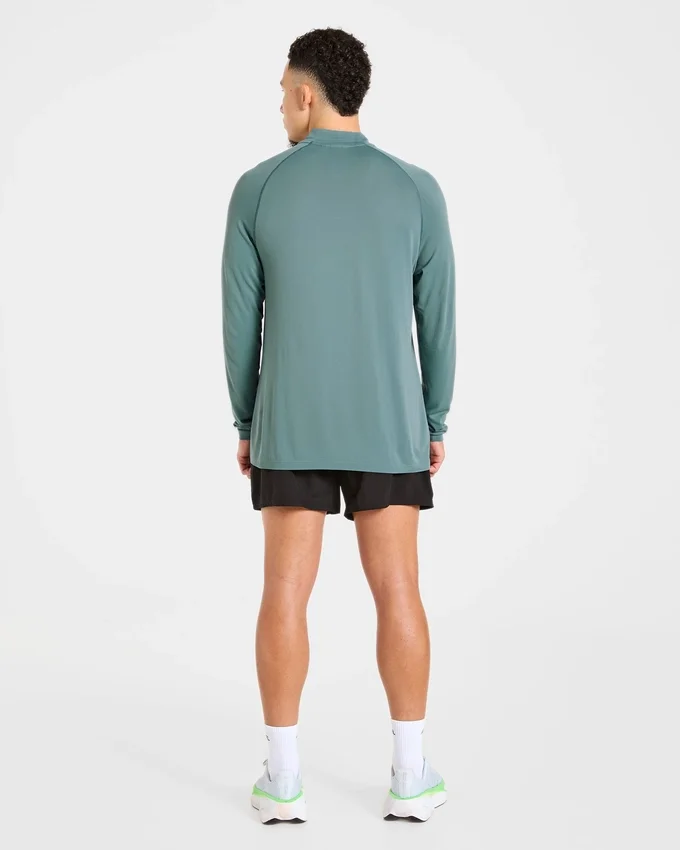 Pull Attain sans coutures à demi-zip