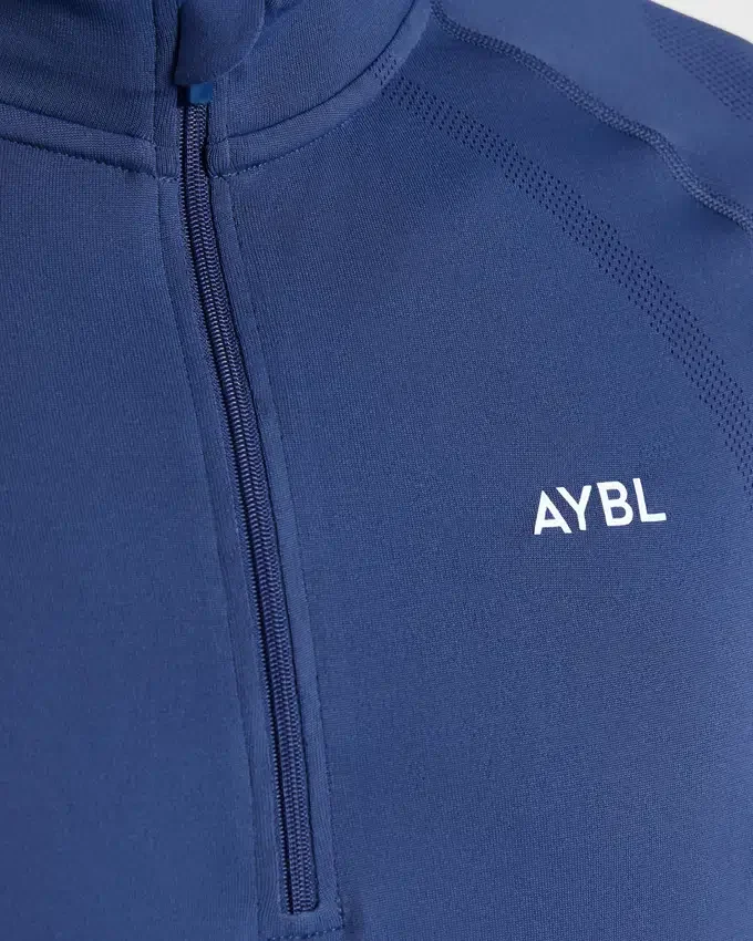 Pull Attain sans coutures à demi-zip