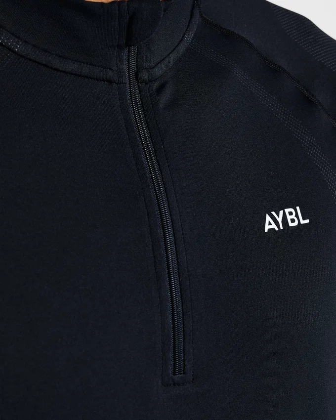 Pull Attain sans coutures à demi-zip