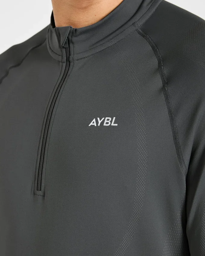 Pull Attain sans coutures à demi-zip