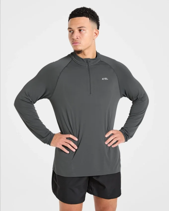 Pull Attain sans coutures à demi-zip