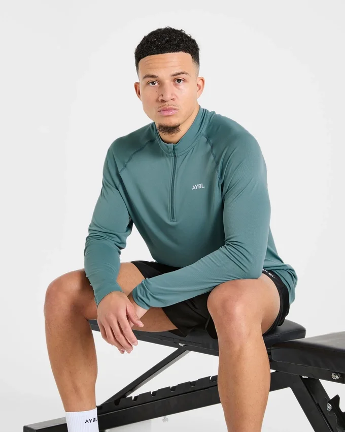 Pull Attain sans coutures à demi-zip