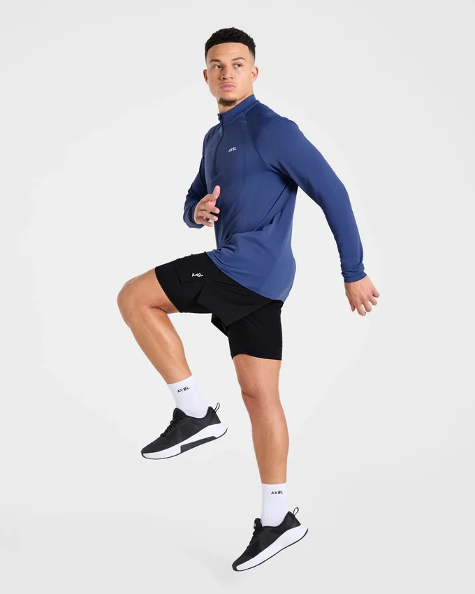 Pull Attain sans coutures à demi-zip