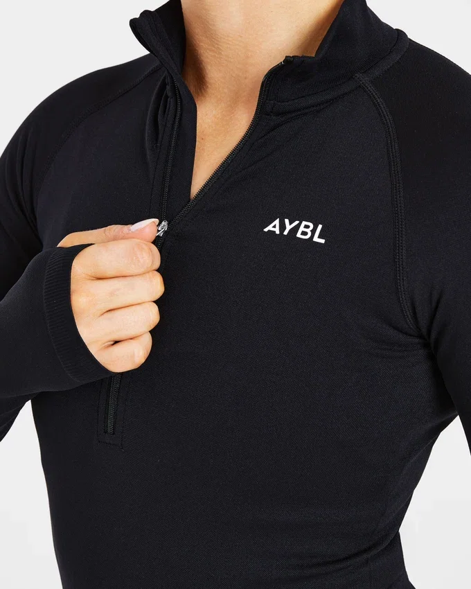 Pull Essential sans coutures à demi-zip