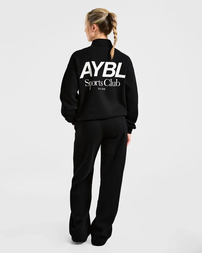 Pull oversize à fermeture éclair 1/4 « Sports Club »