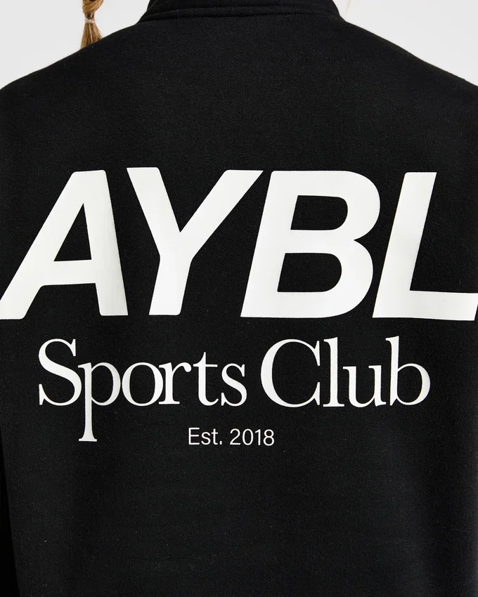 Pull oversize à fermeture éclair 1/4 « Sports Club »