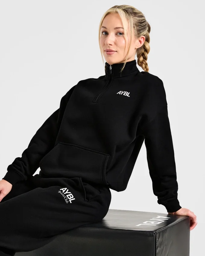 Pull oversize à fermeture éclair 1/4 « Sports Club »