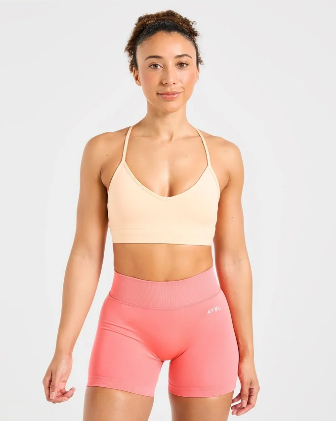 Soutien-gorge de sport à bretelles et col en V « Essential »
