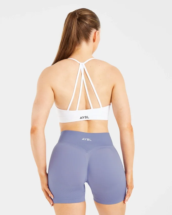 Soutien-gorge de sport à bretelles et col en V « Essential »
