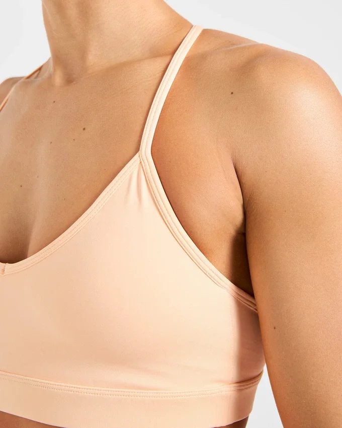 Soutien-gorge de sport à bretelles et col en V « Essential »