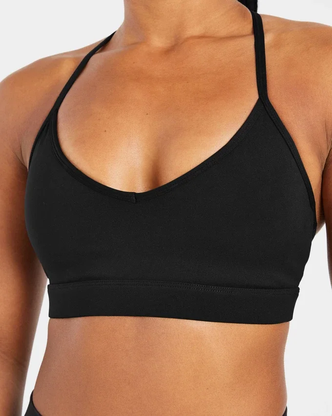 Soutien-gorge de sport à bretelles et col en V « Essential »