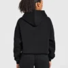 Sweat à capuche oversize avec applique « Varsity »