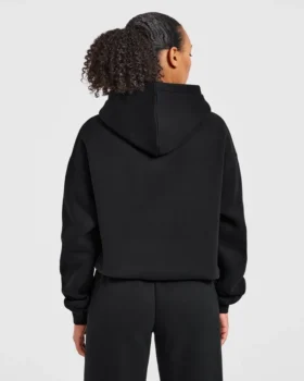 Sweat à capuche oversize avec applique « Varsity »