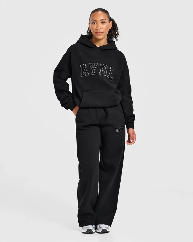 Sweat à capuche oversize avec applique « Varsity »
