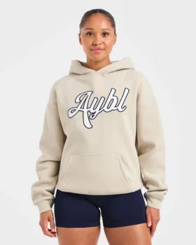 Sweat à capuche oversize avec inscription brodée