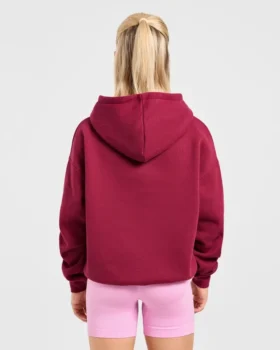 Sweat à capuche oversize avec inscription brodée