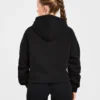Sweat à capuche oversize avec inscription brodée