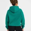 Sweat à capuche oversize avec inscription brodée