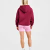 Sweat à capuche oversize avec inscription brodée