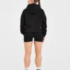 Sweat à capuche oversize avec inscription brodée