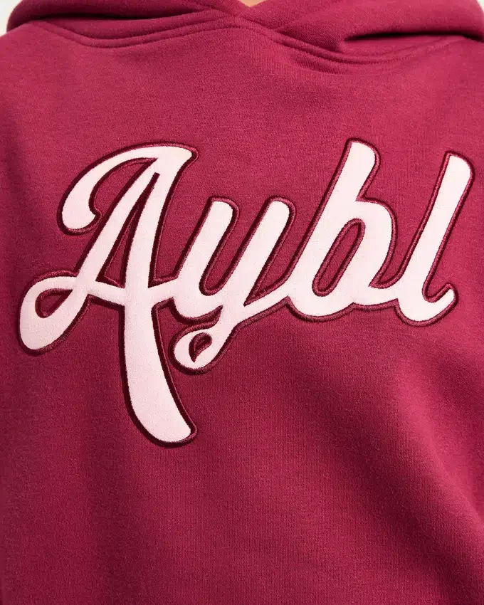 Sweat à capuche oversize avec inscription brodée