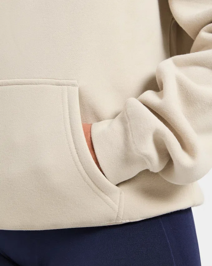Sweat à capuche oversize avec inscription brodée