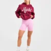 Sweat à capuche oversize avec inscription brodée