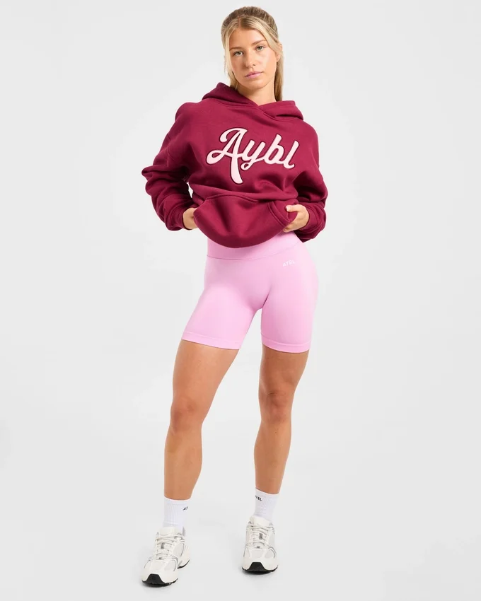 Sweat à capuche oversize avec inscription brodée