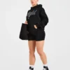 Sweat à capuche oversize avec inscription brodée