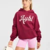 Sweat à capuche oversize avec inscription brodée