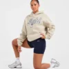 Sweat à capuche oversize avec inscription brodée