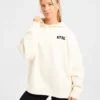 Sweat à capuche oversize en maille avec logo minimaliste « Varsity »