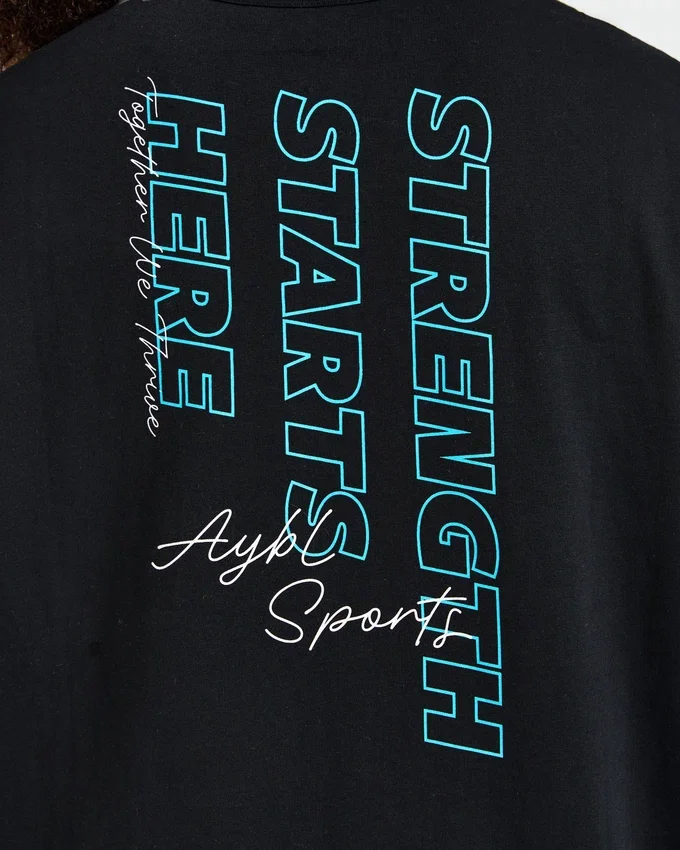 T-shirt oversize « Strength Starts Here »
